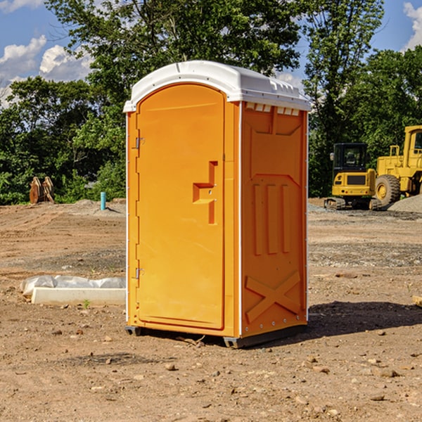 how often are the portable restrooms cleaned and serviced during a rental period in Patten